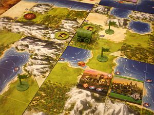 Zielony w trakcie ekspansji: widać jego miasto, armie, osadników oraz neutralne wioski czekające na podbicie<br/>Źródło: Boardgamegeek