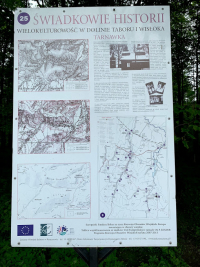 Tabliczka informacyjna przy resztkach cmentarza w Tarnawce<br/>fot. Marcin Grabiński